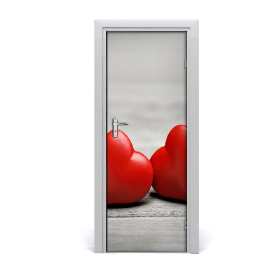 Fototapeta na dvere Červené srdcia na drevenom pozadí