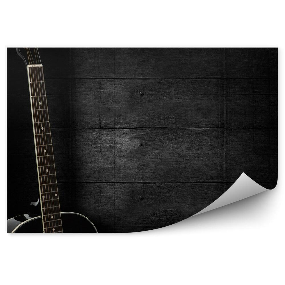 Fototapeta Čierna akustická gitara tmavé pozadie dosky