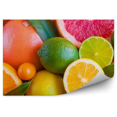 Fototapeta na stenu Citrusové ovocie čerstvé rozkrojené polovice listov