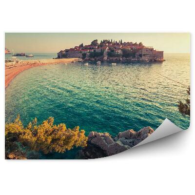 Fototapeta More vegetácia pláž ležadlá mesto