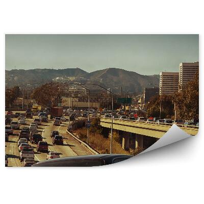 Fototapeta na stenu Hory mrakodrapy diaľnica autá Los Angeles