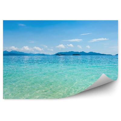 Fototapeta na stenu Piesok Oceán Hory Obloha Mraky