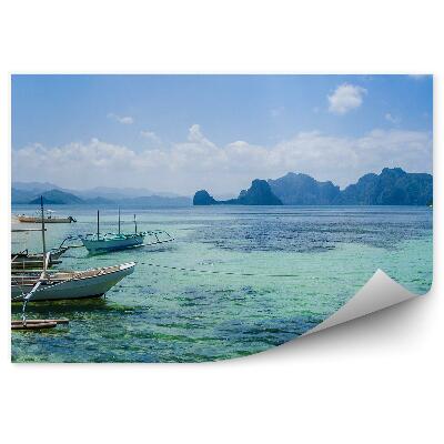 Fototapeta na stenu Loď čistá voda palmy piesočná pláž