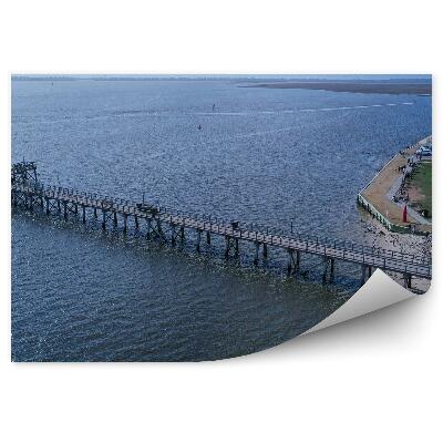 Fototapeta na stenu Pohľad zhora na mólo voda breh