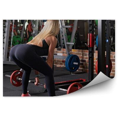 Fototapeta na stenu Ženska telovadnica dvigovanje uteži