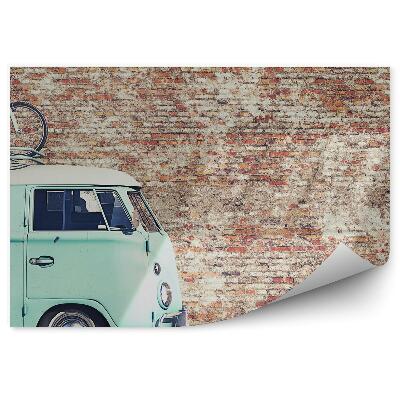 Fototapeta Tehlový múr a zelená dodávka