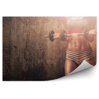 Fototapeta Ženska dvigovanje uteži beton