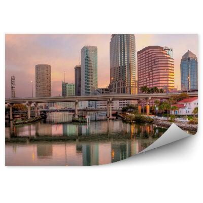 Fototapeta na stenu Mrakodrapy morský most západ slnka