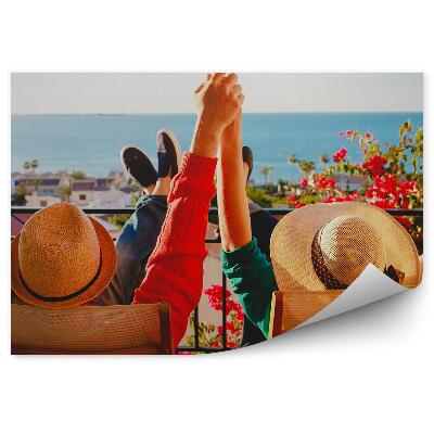 Fototapeta na stenu Šťastný Pár Relaxovať Balkón Terasa Kvety Budovy Výhľad Na Oceán