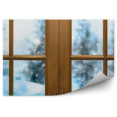 Fototapeta na stenu Zatvorené okno s výhľadom na zasnežený les