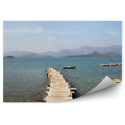 Fototapeta Leseni pomol otok čolni