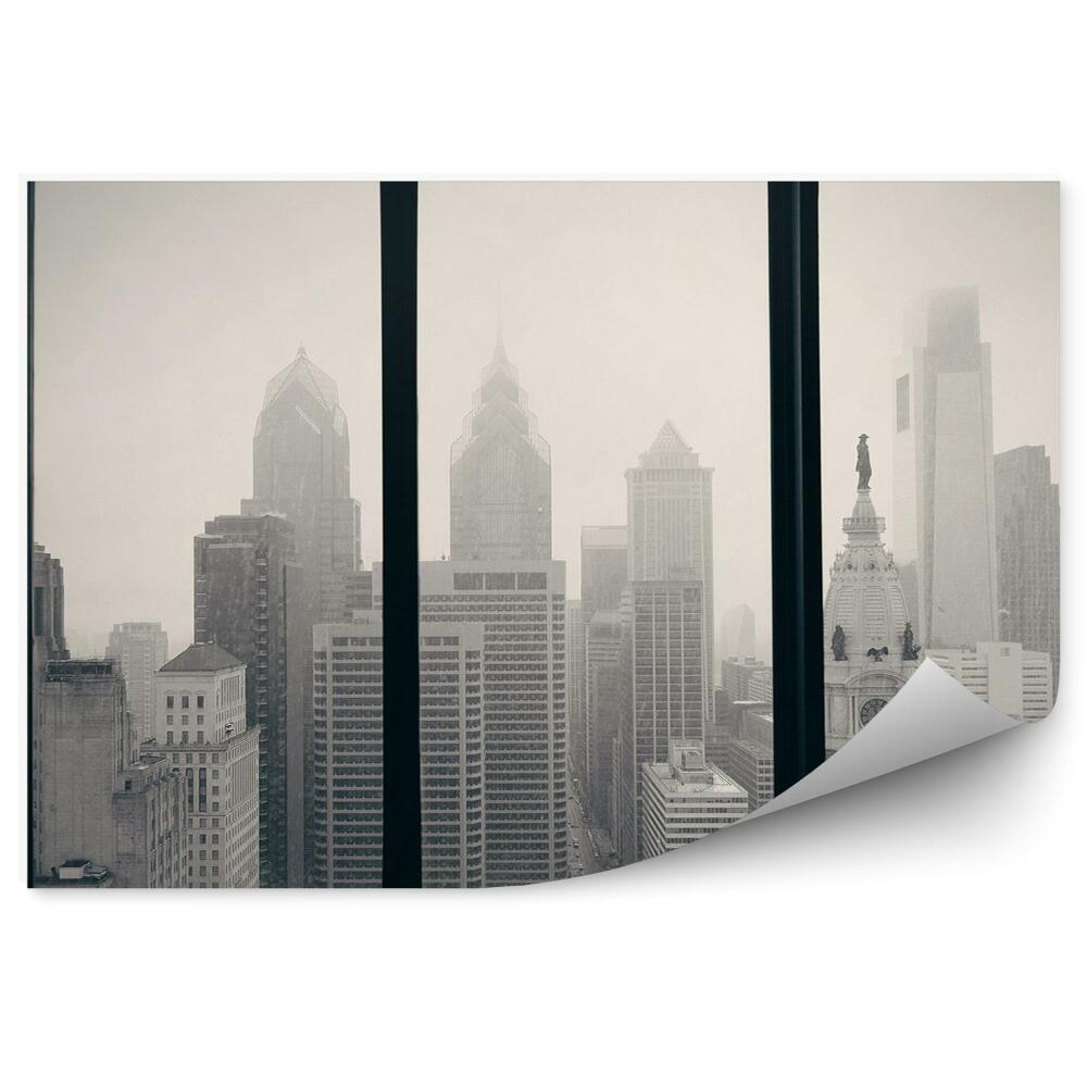 Fototapeta Čiernobiela fotografia mesta za oknom