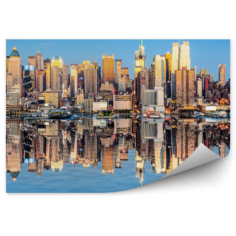 Fototapeta Mrakodrapy svetlá tiene rieka New York obloha