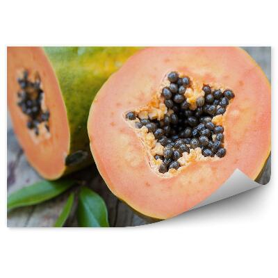 Fototapeta Papája rozrezané ovocie polovica drevený stôl