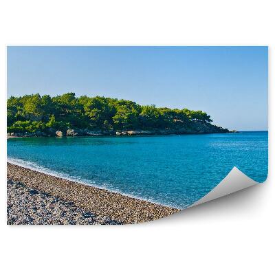 Fototapeta Modrá lagúna vegetácia kamienková pláž