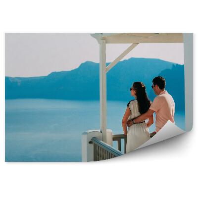 Fototapeta na stenu Mladý pár more hory terasa Santorini Grécko