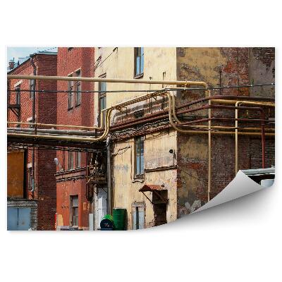 Fototapeta na stenu Zgradbe tovarne s cevmi