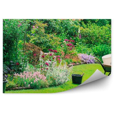 Fototapeta na stenu Záhradné náradie kvety zelené leto