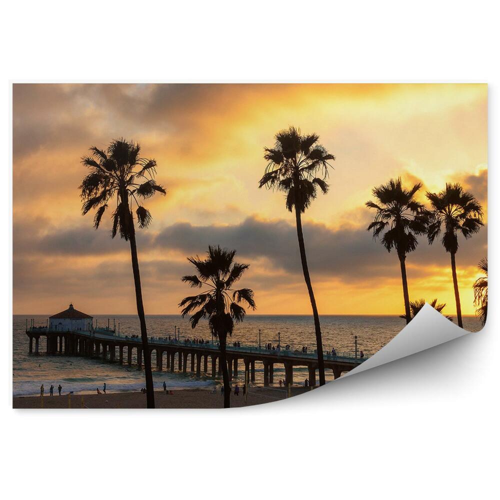 Fototapeta Pomol na plaži palme sončni zahod