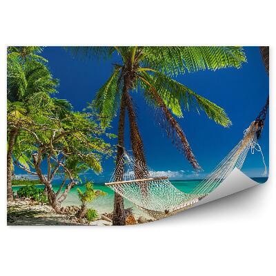 Fototapeta na stenu Prázdna hojdacia sieť v tieni paliem