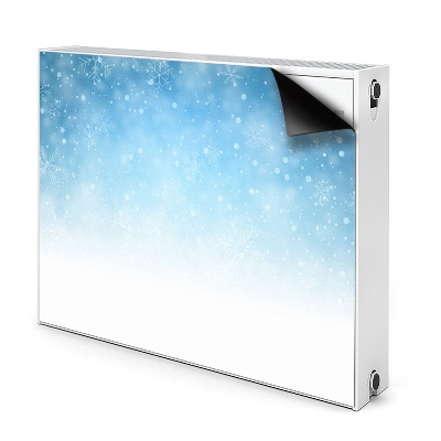 Dekoračný magnet na radiátor Snehové vločky na modrom pozadí