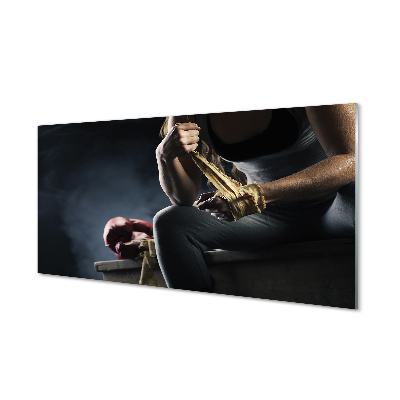 Sklenený obraz Žena si obväzuje ruky