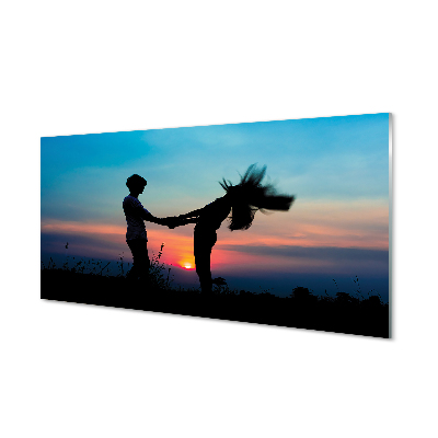 Obraz na skle Ľudia západná obloha na lúke