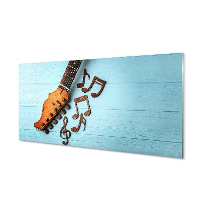 Sklenený obraz Gitarové noty na modrom pozadí