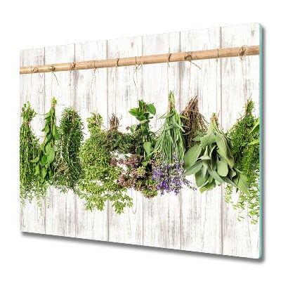 Doska na krájanie Sušené bylinky na drevenej stene,