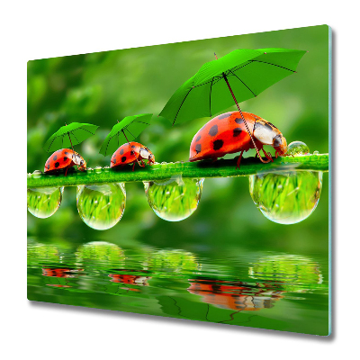 Sklenená doska na krájanie Tri berušky s dáždnikmi